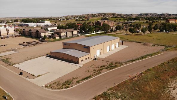 Functional +/-18,000+ SQ FT Shop on 3.11 Acres in Glendive, MT: 123 W Oregon Ln, Glendive, MT 59330